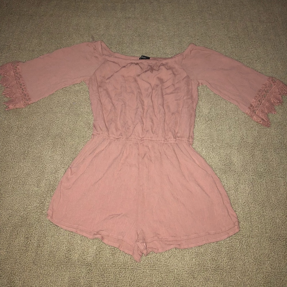 Pink romper with lace arms fringe